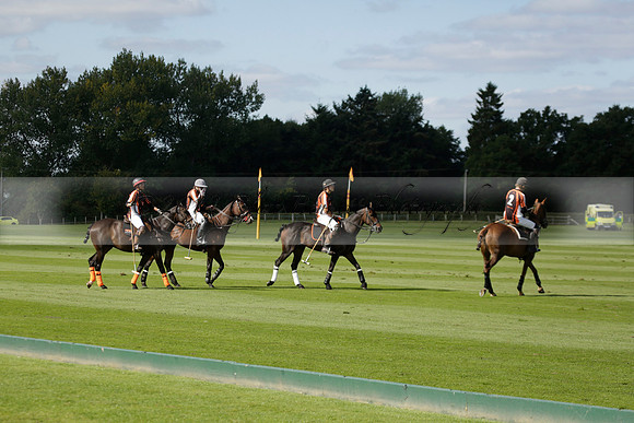 Four Quarters Black (black) v BHC (red) in a Autumn Cup polo match on Ambersham 2 at Cowdray Park Polo Club on Friday 20 September 2013 www.polopictures.co.uk
