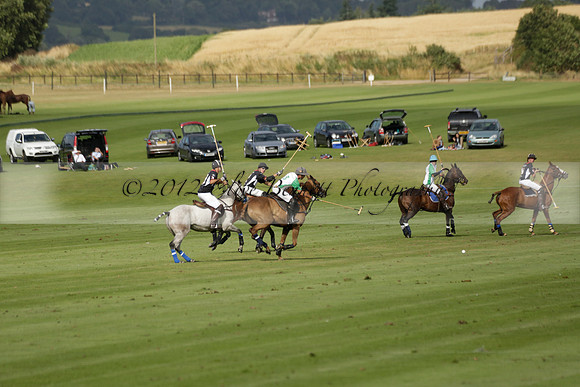 Jaeger Le Coultre (black)  v Wairakei Pastoral (white) in a Jaeger Le Coultre Holden White Cup polo match played on 29 July 2013 at Cowdray Park Polo Club on Brooksfieldwww.polopictures.co.uk