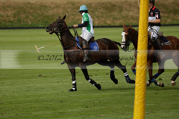 Jaeger Le Coultre (black)  v Wairakei Pastoral (white) in a Jaeger Le Coultre Holden White Cup polo match played on 29 July 2013 at Cowdray Park Polo Club on Brooksfieldwww.polopictures.co.uk