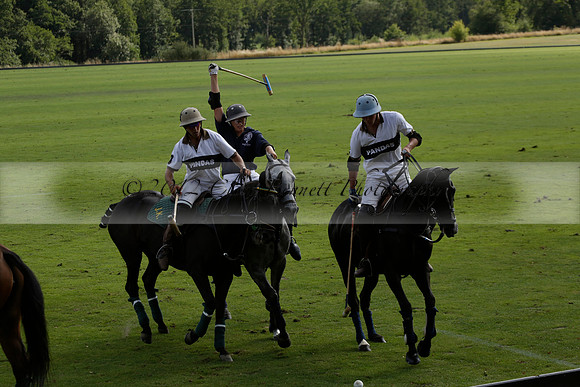 Pandas (white) v Home Farm (navy) in a Park House West Sussex Cup Polo match on Brooksfield at Cowdray Park Polo Club on Friday 30 August 2013. 2013.08.30 www.polopictures.co.uk
