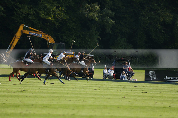 Pluma Negra (white) v Shoreline (black) in the Brecknock Cup Subsidiary final polo match played on Sunday 25 August 2013 at Cowdray Park Polo Club on Ambersham 1. 2013.10.12 www.polopictures.co.uk