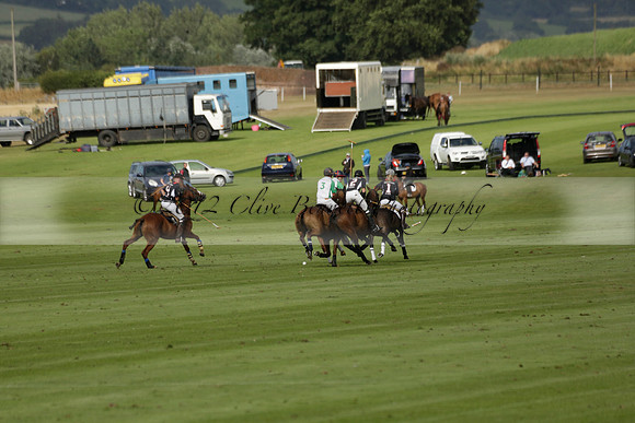 Jaeger Le Coultre (black)  v Wairakei Pastoral (white) in a Jaeger Le Coultre Holden White Cup polo match played on 29 July 2013 at Cowdray Park Polo Club on Brooksfieldwww.polopictures.co.uk