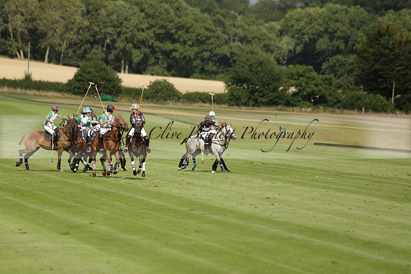 Jaeger Le Coultre (black)  v Wairakei Pastoral (white) in a Jaeger Le Coultre Holden White Cup polo match played on 29 July 2013 at Cowdray Park Polo Club on Brooksfieldwww.polopictures.co.uk