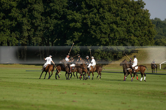 Pluma Negra (white) v Shoreline (black) in the Brecknock Cup Subsidiary final polo match played on Sunday 25 August 2013 at Cowdray Park Polo Club on Ambersham 1. 2013.10.12 www.polopictures.co.uk