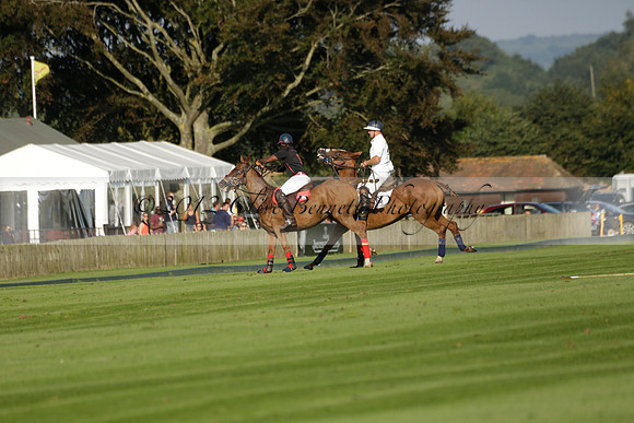 Pluma Negra (white) v Shoreline (black) in the Brecknock Cup Subsidiary final polo match played on Sunday 25 August 2013 at Cowdray Park Polo Club on Ambersham 1. 2013.10.12 www.polopictures.co.uk