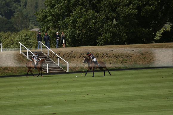Jaeger Le Coultre (black)  v Wairakei Pastoral (white) in a Jaeger Le Coultre Holden White Cup polo match played on 29 July 2013 at Cowdray Park Polo Club on Brooksfieldwww.polopictures.co.uk