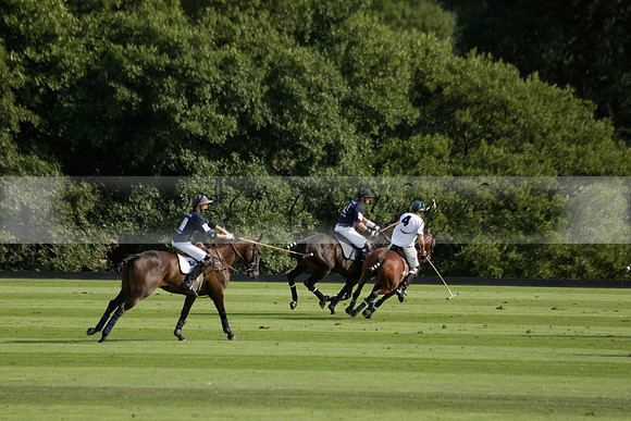 Pandas (white) v Home Farm (navy) in a Park House West Sussex Cup Polo match on Brooksfield at Cowdray Park Polo Club on Friday 30 August 2013. 2013.08.30 www.polopictures.co.uk
