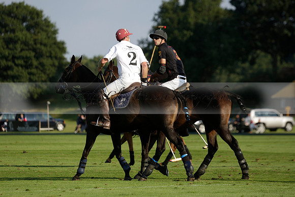 Pluma Negra (white) v Shoreline (black) in the Brecknock Cup Subsidiary final polo match played on Sunday 25 August 2013 at Cowdray Park Polo Club on Ambersham 1. 2013.10.12 www.polopictures.co.uk