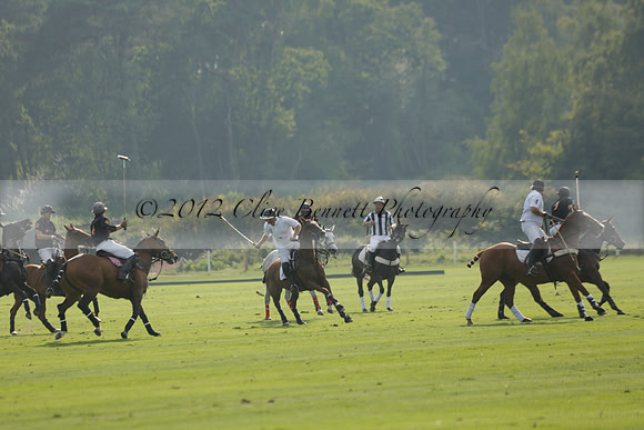 Pluma Negra (white) v Shoreline (black) in the Brecknock Cup Subsidiary final polo match played on Sunday 25 August 2013 at Cowdray Park Polo Club on Ambersham 1. 2013.10.12 www.polopictures.co.uk