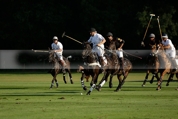 Pluma Negra (white) v Shoreline (black) in the Brecknock Cup Subsidiary final polo match played on Sunday 25 August 2013 at Cowdray Park Polo Club on Ambersham 1. 2013.10.12 www.polopictures.co.uk