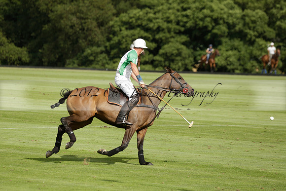 Jaeger Le Coultre (black)  v Wairakei Pastoral (white) in a Jaeger Le Coultre Holden White Cup polo match played on 29 July 2013 at Cowdray Park Polo Club on Brooksfieldwww.polopictures.co.uk