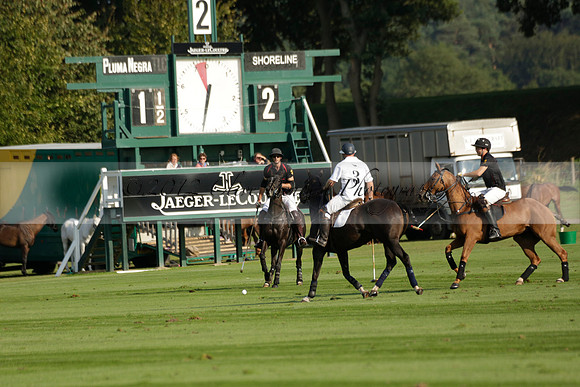 Pluma Negra (white) v Shoreline (black) in the Brecknock Cup Subsidiary final polo match played on Sunday 25 August 2013 at Cowdray Park Polo Club on Ambersham 1. 2013.10.12 www.polopictures.co.uk