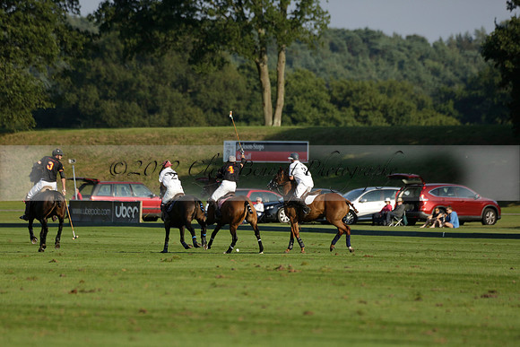 Pluma Negra (white) v Shoreline (black) in the Brecknock Cup Subsidiary final polo match played on Sunday 25 August 2013 at Cowdray Park Polo Club on Ambersham 1. 2013.10.12 www.polopictures.co.uk