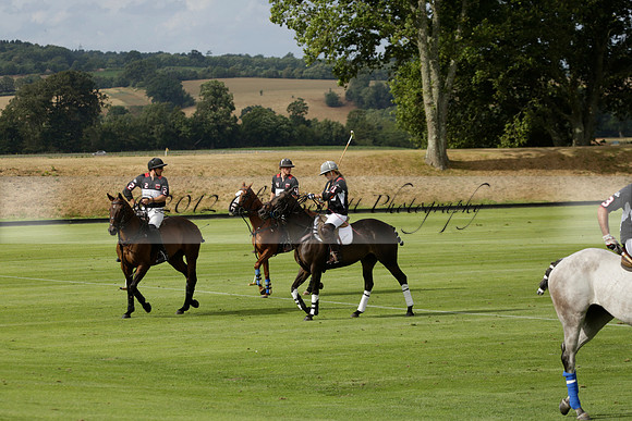 Jaeger Le Coultre (black)  v Wairakei Pastoral (white) in a Jaeger Le Coultre Holden White Cup polo match played on 29 July 2013 at Cowdray Park Polo Club on Brooksfieldwww.polopictures.co.uk