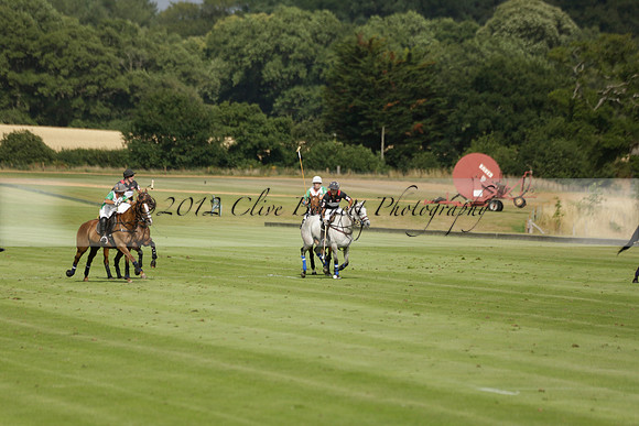 Jaeger Le Coultre (black)  v Wairakei Pastoral (white) in a Jaeger Le Coultre Holden White Cup polo match played on 29 July 2013 at Cowdray Park Polo Club on Brooksfieldwww.polopictures.co.uk