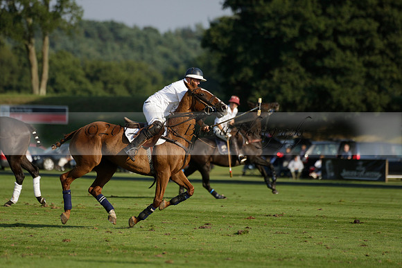 Pluma Negra (white) v Shoreline (black) in the Brecknock Cup Subsidiary final polo match played on Sunday 25 August 2013 at Cowdray Park Polo Club on Ambersham 1. 2013.10.12 www.polopictures.co.uk