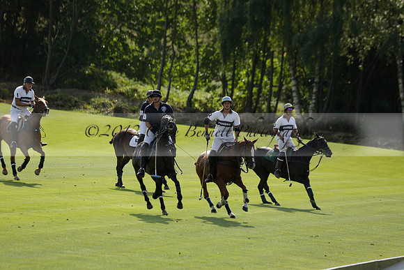 Pandas (white) v Home Farm (navy) in a Park House West Sussex Cup Polo match on Brooksfield at Cowdray Park Polo Club on Friday 30 August 2013. 2013.08.30 www.polopictures.co.uk