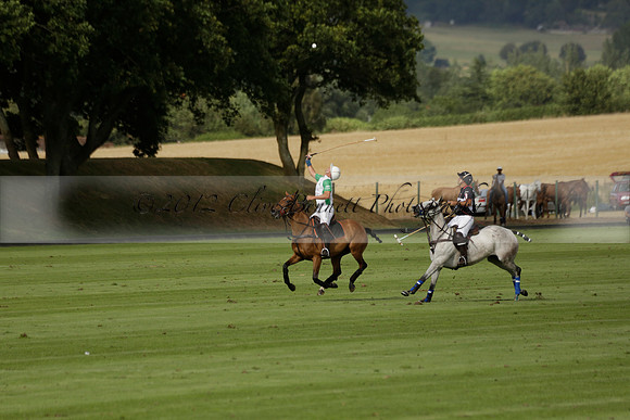 Jaeger Le Coultre (black)  v Wairakei Pastoral (white) in a Jaeger Le Coultre Holden White Cup polo match played on 29 July 2013 at Cowdray Park Polo Club on Brooksfieldwww.polopictures.co.uk