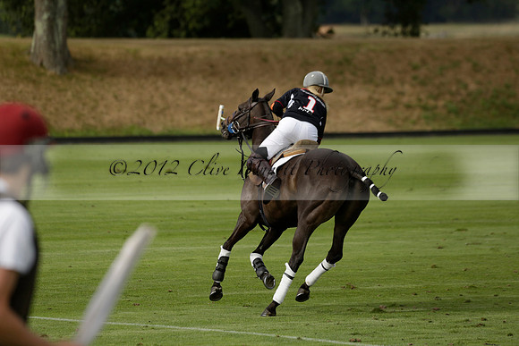 Jaeger Le Coultre (black)  v Wairakei Pastoral (white) in a Jaeger Le Coultre Holden White Cup polo match played on 29 July 2013 at Cowdray Park Polo Club on Brooksfieldwww.polopictures.co.uk