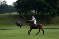 Pluma Negra (white) v Shoreline (black) in the Brecknock Cup Subsidiary final polo match played on Sunday 25 August 2013 at Cowdray Park Polo Club on Ambersham 1. 2013.10.12 www.polopictures.co.uk