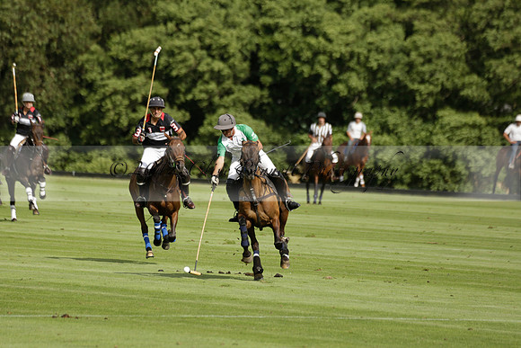 Jaeger Le Coultre (black)  v Wairakei Pastoral (white) in a Jaeger Le Coultre Holden White Cup polo match played on 29 July 2013 at Cowdray Park Polo Club on Brooksfieldwww.polopictures.co.uk