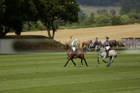 Jaeger Le Coultre (black)  v Wairakei Pastoral (white) in a Jaeger Le Coultre Holden White Cup polo match played on 29 July 2013 at Cowdray Park Polo Club on Brooksfieldwww.polopictures.co.uk