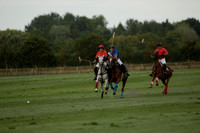 Ghost Chilli (blue) v Team Tonic (red) in a Lodsworth Cup Polo match on Ambersham 3 at Cowdray Park Polo Club on Friday 30 August 2013. 2013.08.30 www.polopictures.co.uk