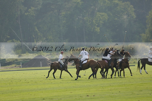 Pluma Negra (white) v Shoreline (black) in the Brecknock Cup Subsidiary final polo match played on Sunday 25 August 2013 at Cowdray Park Polo Club on Ambersham 1. 2013.10.12 www.polopictures.co.uk