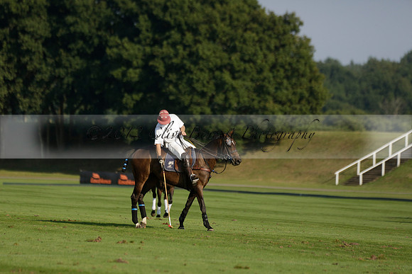 Pluma Negra (white) v Shoreline (black) in the Brecknock Cup Subsidiary final polo match played on Sunday 25 August 2013 at Cowdray Park Polo Club on Ambersham 1. 2013.10.12 www.polopictures.co.uk