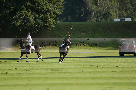 Pluma Negra (white) v Shoreline (black) in the Brecknock Cup Subsidiary final polo match played on Sunday 25 August 2013 at Cowdray Park Polo Club on Ambersham 1. 2013.10.12 www.polopictures.co.uk