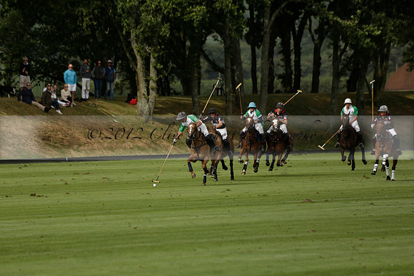 Jaeger Le Coultre (black)  v Wairakei Pastoral (white) in a Jaeger Le Coultre Holden White Cup polo match played on 29 July 2013 at Cowdray Park Polo Club on Brooksfieldwww.polopictures.co.uk