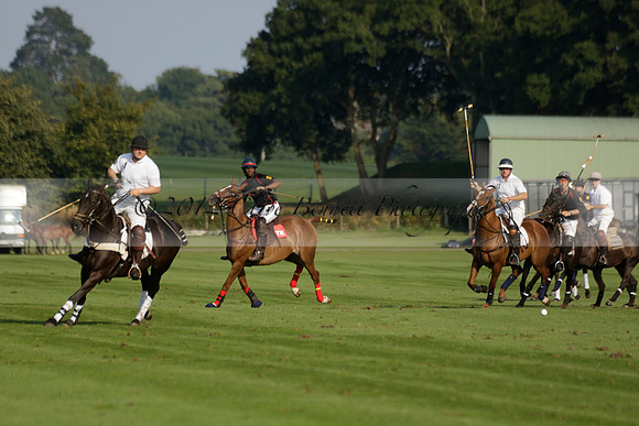 Pluma Negra (white) v Shoreline (black) in the Brecknock Cup Subsidiary final polo match played on Sunday 25 August 2013 at Cowdray Park Polo Club on Ambersham 1. 2013.10.12 www.polopictures.co.uk