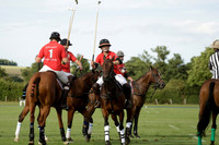 Ice Craft (red) v Hincha Pelota (black) in a Lodsworth Cup Polo match on Ambersham 5 at Cowdray Park Polo Club on Friday 30 August 2013. 2013.08.30 www.polopictures.co.uk