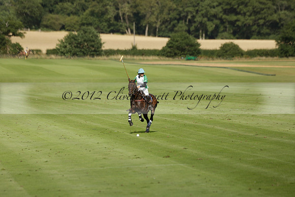 Jaeger Le Coultre (black)  v Wairakei Pastoral (white) in a Jaeger Le Coultre Holden White Cup polo match played on 29 July 2013 at Cowdray Park Polo Club on Brooksfieldwww.polopictures.co.uk
