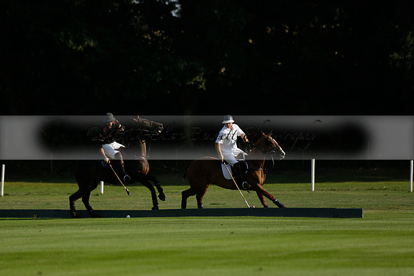 Pluma Negra (white) v Shoreline (black) in the Brecknock Cup Subsidiary final polo match played on Sunday 25 August 2013 at Cowdray Park Polo Club on Ambersham 1. 2013.10.12 www.polopictures.co.uk