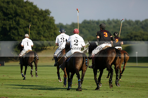 Pluma Negra (white) v Shoreline (black) in the Brecknock Cup Subsidiary final polo match played on Sunday 25 August 2013 at Cowdray Park Polo Club on Ambersham 1. 2013.10.12 www.polopictures.co.uk