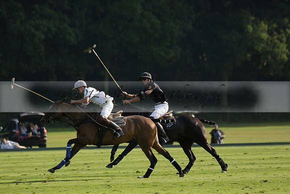 Pluma Negra (white) v Shoreline (black) in the Brecknock Cup Subsidiary final polo match played on Sunday 25 August 2013 at Cowdray Park Polo Club on Ambersham 1. 2013.10.12 www.polopictures.co.uk