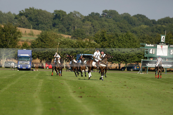 Pluma Negra (white) v Shoreline (black) in the Brecknock Cup Subsidiary final polo match played on Sunday 25 August 2013 at Cowdray Park Polo Club on Ambersham 1. 2013.10.12 www.polopictures.co.uk