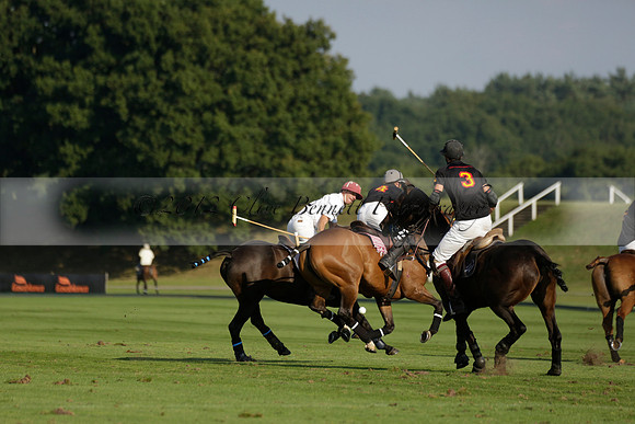 Pluma Negra (white) v Shoreline (black) in the Brecknock Cup Subsidiary final polo match played on Sunday 25 August 2013 at Cowdray Park Polo Club on Ambersham 1. 2013.10.12 www.polopictures.co.uk