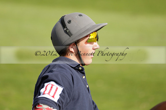 Pandas (white) v Home Farm (navy) in a Park House West Sussex Cup Polo match on Brooksfield at Cowdray Park Polo Club on Friday 30 August 2013. 2013.08.30 www.polopictures.co.uk