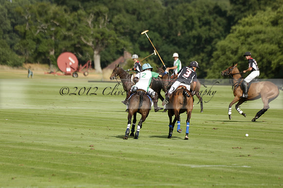 Jaeger Le Coultre (black)  v Wairakei Pastoral (white) in a Jaeger Le Coultre Holden White Cup polo match played on 29 July 2013 at Cowdray Park Polo Club on Brooksfieldwww.polopictures.co.uk