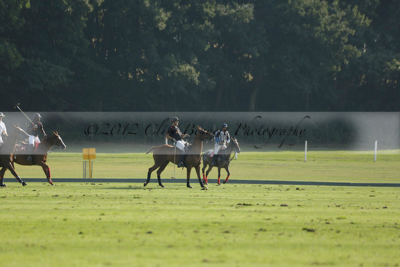 Pluma Negra (white) v Shoreline (black) in the Brecknock Cup Subsidiary final polo match played on Sunday 25 August 2013 at Cowdray Park Polo Club on Ambersham 1. 2013.10.12 www.polopictures.co.uk