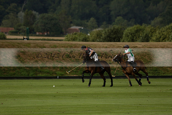 Jaeger Le Coultre (black)  v Wairakei Pastoral (white) in a Jaeger Le Coultre Holden White Cup polo match played on 29 July 2013 at Cowdray Park Polo Club on Brooksfieldwww.polopictures.co.uk