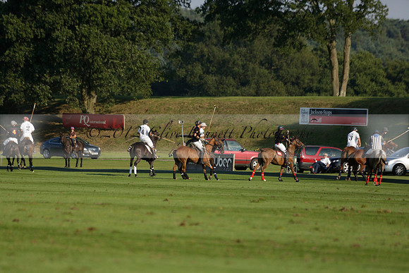 Pluma Negra (white) v Shoreline (black) in the Brecknock Cup Subsidiary final polo match played on Sunday 25 August 2013 at Cowdray Park Polo Club on Ambersham 1. 2013.10.12 www.polopictures.co.uk