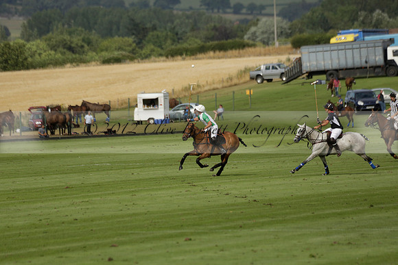 Jaeger Le Coultre (black)  v Wairakei Pastoral (white) in a Jaeger Le Coultre Holden White Cup polo match played on 29 July 2013 at Cowdray Park Polo Club on Brooksfieldwww.polopictures.co.uk
