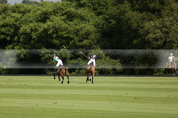 Jaeger Le Coultre (black)  v Wairakei Pastoral (white) in a Jaeger Le Coultre Holden White Cup polo match played on 29 July 2013 at Cowdray Park Polo Club on Brooksfieldwww.polopictures.co.uk