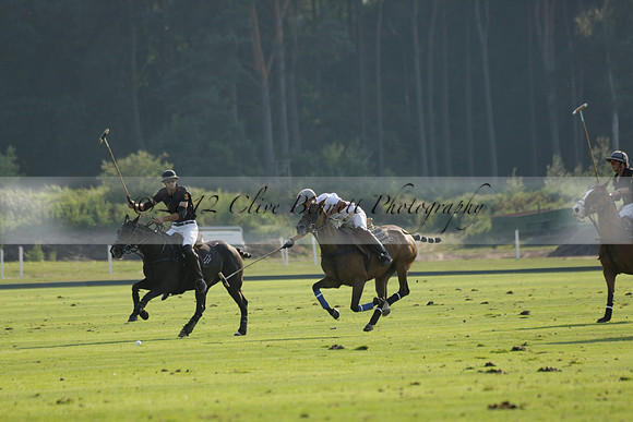Pluma Negra (white) v Shoreline (black) in the Brecknock Cup Subsidiary final polo match played on Sunday 25 August 2013 at Cowdray Park Polo Club on Ambersham 1. 2013.10.12 www.polopictures.co.uk
