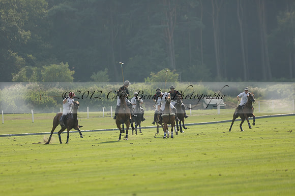 Pluma Negra (white) v Shoreline (black) in the Brecknock Cup Subsidiary final polo match played on Sunday 25 August 2013 at Cowdray Park Polo Club on Ambersham 1. 2013.10.12 www.polopictures.co.uk