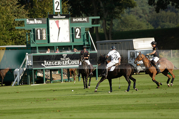 Pluma Negra (white) v Shoreline (black) in the Brecknock Cup Subsidiary final polo match played on Sunday 25 August 2013 at Cowdray Park Polo Club on Ambersham 1. 2013.10.12 www.polopictures.co.uk