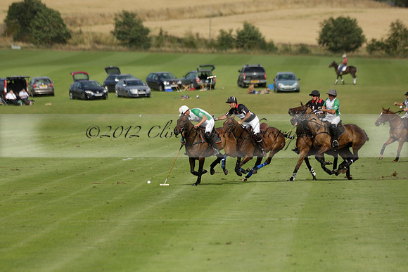 Jaeger Le Coultre (black)  v Wairakei Pastoral (white) in a Jaeger Le Coultre Holden White Cup polo match played on 29 July 2013 at Cowdray Park Polo Club on Brooksfieldwww.polopictures.co.uk